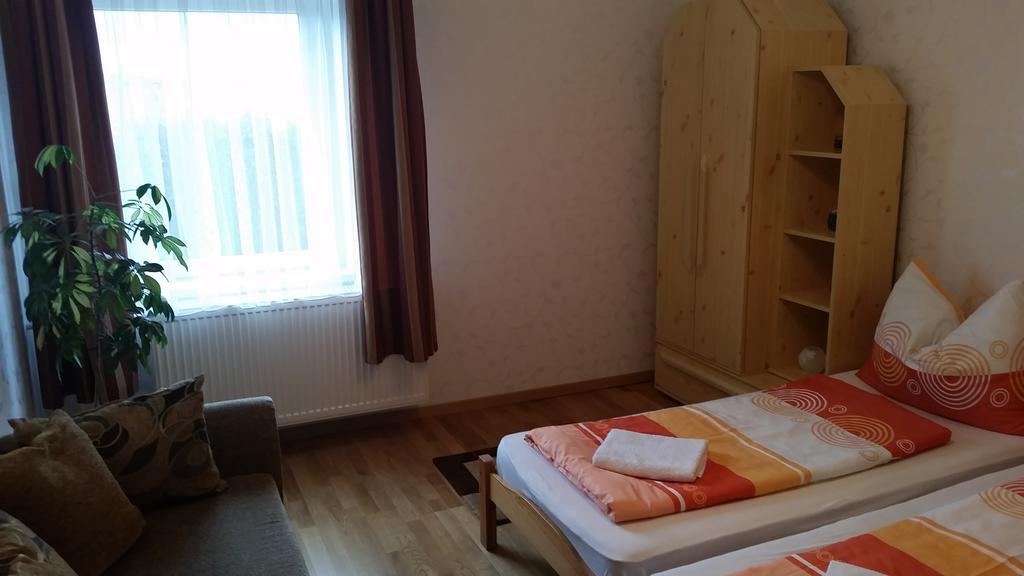Fadora Apartman Тихани Стая снимка